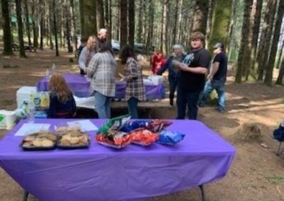 group having a picnic in the woods